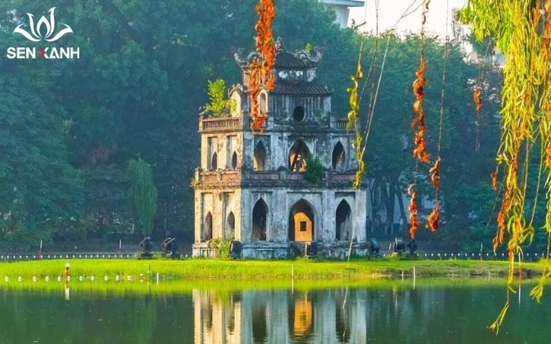 Hình ảnh minh họa sự tích Hồ Gươm với Rùa Vàng nổi lên đòi gươm từ vua Lê Lợi trên thuyền, biểu tượng của lịch sử hào hùng dân tộc